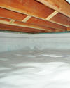 a moisture barrier installed on the walls and floors of a crawl space in Canton