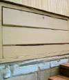 an old-fashioned crawl space door in Montrose about to be replaced