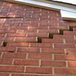 stair step cracking on a foundation wall in Macomb