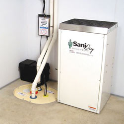 Sump pump system, dehumidifier, and basement wall panels installed during a sump pump installation in Hamilton