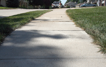 Sunken sidewalk raised with PolyLevel®
