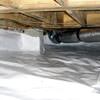 Bare floor joists in a sealed, insulated crawl space in Fairfield.
