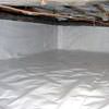 A crawl space vapor barrier has been installed on the walls and floors of this space in Rushville.