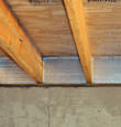SilverGlo™ insulation installed in a floor joist in Kahoka