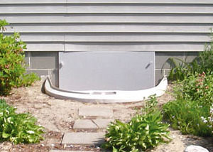 Rigid plastic crawl space access well installed in a Kirksville crawl space