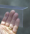 Closeup of a clear plastic covering on a Carthage crawl space block wall