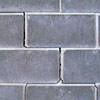 A diagonal stair-step crack found along a foundation wall in a West Point home