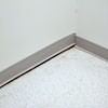 A partition wall separating from the floor in a Donnellson home.