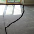 a huge crack in a concrete slab floor in Kirksville