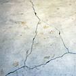 foundation heaving cracks in a slab floor in Peoria