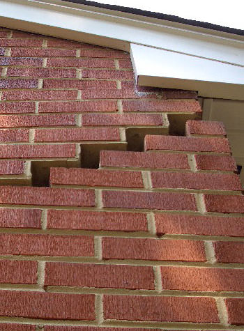 stair step cracking on a foundation wall in Macomb
