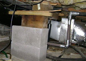 a poorly designed crawl space support system installed in a Mason City home