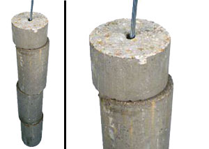 A cutaway image of concrete piers string along a wire, intended for foundation repairs.