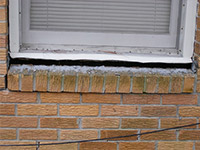A window sill cracking and separating from the foundation wall in a Montrose home.