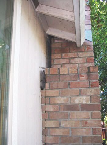 sinking, leaning chimneys that are in danger of collapse in Camp Point