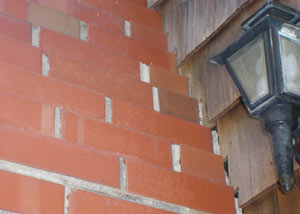 a repaired chimney in Memphis that had shown serious foundation damage and was repaired with a helical pier system.
