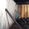 Temporary foundation wall supports stabilizing a Peoria home