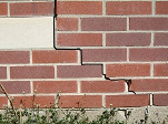 stair step cracking on a foundation wall in Macomb