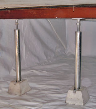 Crawl space jack posts installed in conjunction with a crawl space vapor barrier in Edina