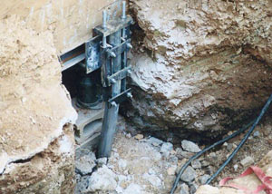 a bent, failed foundation push pier installed in Kirksville.