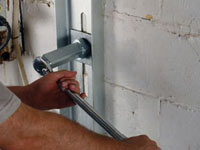 Mounting a foundation wall channel anchor in Palmyra.
