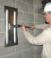 Tightening a wall anchor plate in Peoria, Illinois, Iowa, and Missouri