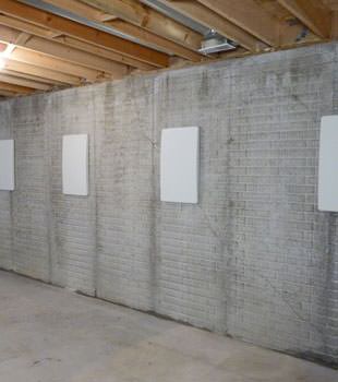 Wall anchor covers covering a foundation wall repair system in Carthage, Canton, Kahoka, Hamilton, Mason City