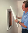 Quincy installation of wall anchor plate covers for a finished basement