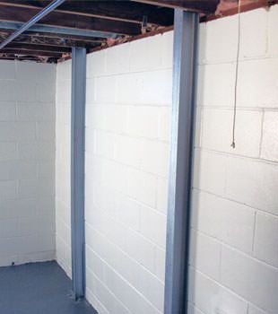 A PowerBrace™ i-beam foundation wall repair system in Quincy