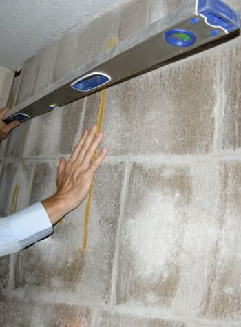 severe foundation wall failure symptoms of a basement wall in Bellflower