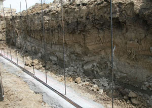 Soil layers exposed while excavating to construct a new foundation in Carthage