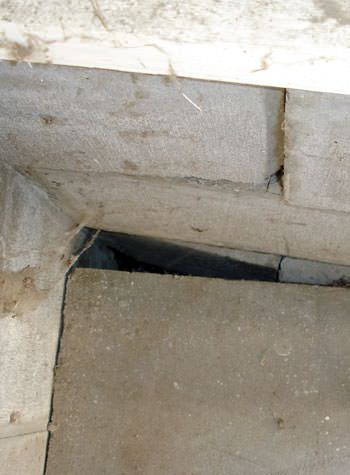 inward rotation of a foundation wall damaged by street creep in a garage in Elliott