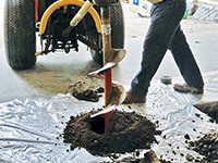 Digging the hole used for wall anchor installation in Montrose.