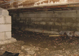 Rotting, decaying crawl space wood damaged over time in Liberty