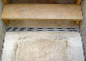 Our grated drain system installed on a leaking basement staircase in Edina.