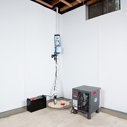 Sump pump system, dehumidifier, and basement wall panels installed during a sump pump installation in Hamilton