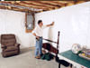 A basement wall covering for creating a vapor barrier on basement walls in Canton