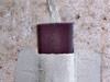 A basement wall covering for creating a vapor barrier on basement walls in La Harpe