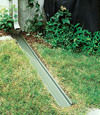 A recessed gutter drain extension installed in Astoria, Illinois, Iowa, and Missouri