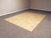 Tiled and carpeted basement flooring options for basement floor finishing in Fort Madison
