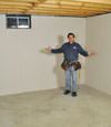 Palmyra basement insulation covered by EverLast™ wall paneling, with SilverGlo™ insulation underneath