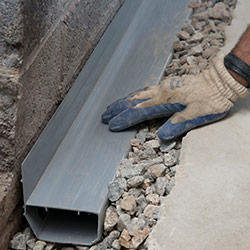 installing a drain tile system in a Warsaw home